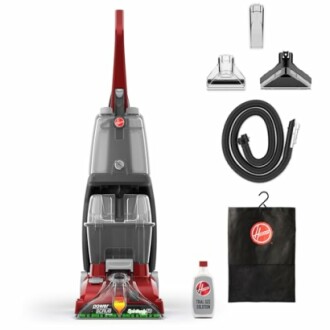 Carpet cleaner with various attachments and cleaning solution.