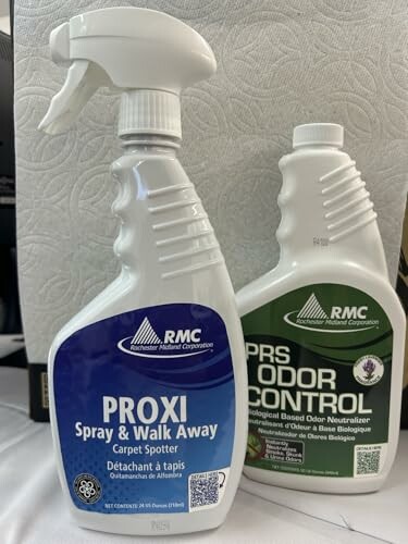 Two cleaning spray bottles labeled Proxi and PRS Odor Control.