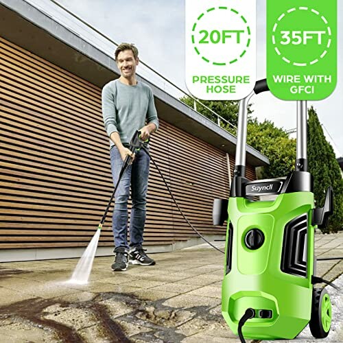 Man using a green pressure washer on a patio