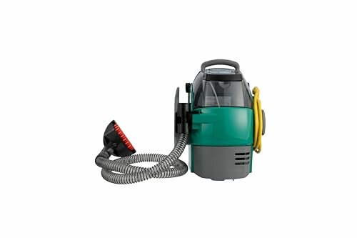 Portable carpet cleaner with hose attachment.