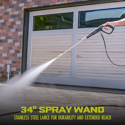 Person using a 34-inch spray wand for cleaning.