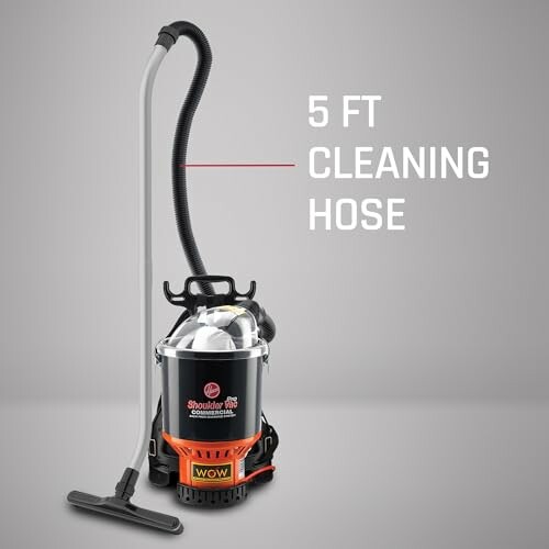 Shoulder vacuum cleaner with 5 ft cleaning hose.